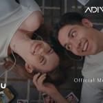 Cantika Putri Kirana dan Fadi Alaydrus berbagi earphone dalam video klip Aku dan Kamu (Tak Ingin Terpisah) milik Adiw dan Tiara Effendy
