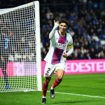 Achraf Hakimi merayakan hat-tricknya untuk PSG